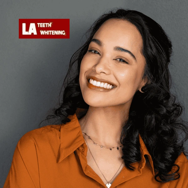 A smiling woman outdoors with glowing, white teeth, symbolizing confidence and youthfulness Oxfordshire